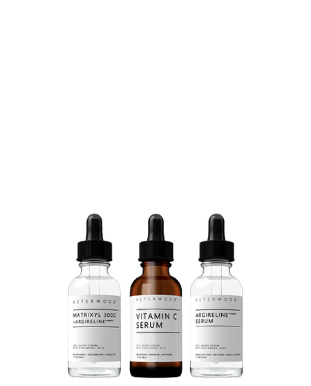 Asterwood Fine Line Trio: Matrixyl 3000 + Argireline serum, Vitamin C Serum, and Argireline Serum standing together on white.