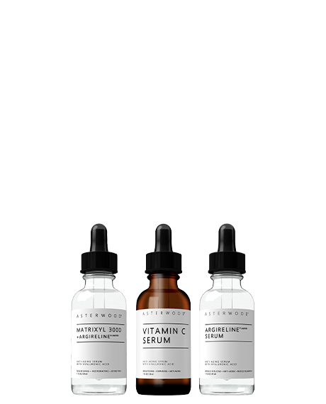 Asterwood Fine Line Trio: Matrixyl 3000 + Argireline serum, Vitamin C Serum, and Argireline Serum standing together on white.