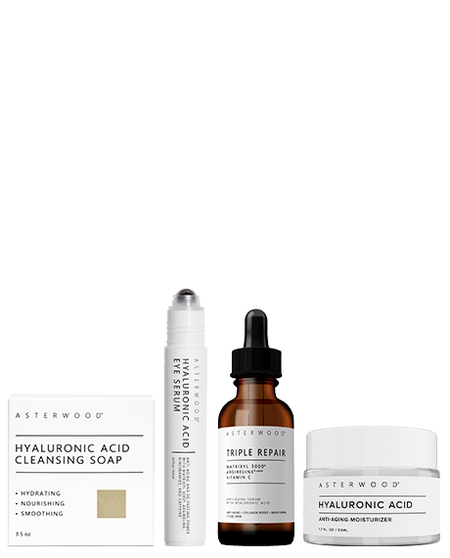 Asterwood Skin Rescue Routine: Hyaluronic Acid Cleansing Soap box, HA Eye Serum pen, Triple Repair amber serum, and HA Anti-Aging Moisturizer jar.
