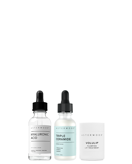 Asterwood Winter Glow Bundle: Hyaluronic Acid serum, Triple Ceramide Barrier Serum, and Volulip Plumping Lip Treatment.