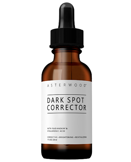Asterwood Dark Spot Corrector 1 fl oz amber bottle with Radianskin and Hyaluronic Acid, label lists corrective, brightening, revitalizing benefits.
