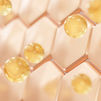 Macro 3D illustration of golden peptide droplets sitting on rose-gold hexagonal cells, representing collagen-building skin structure.