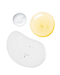 Three swatches from the Fine Line Trio on white, two clear serum drops beside a golden Vitamin C serum droplet.
