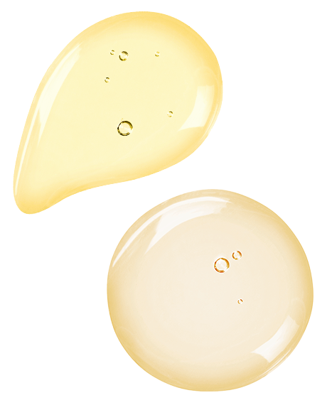Macro swatches of Glow & Go Bundle showing a golden Vitamin C drop and a softer pale-yellow Triple Repair droplet.