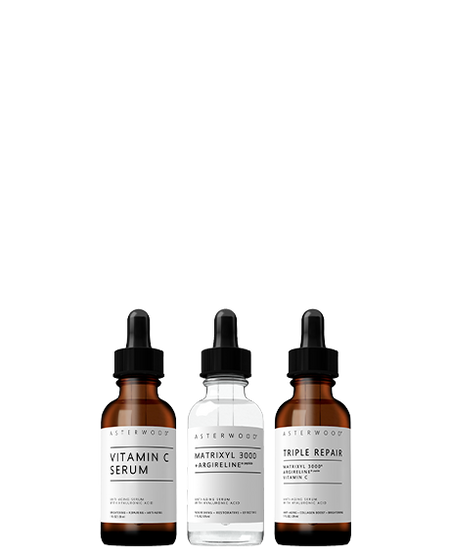 Asterwood Powerhouse Trio: Vitamin C Serum, Matrixyl 3000 + Argireline, and Triple Repair amber serum bottles in a row.