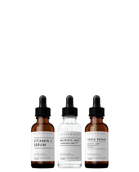 Asterwood Powerhouse Trio: Vitamin C Serum, Matrixyl 3000 + Argireline, and Triple Repair amber serum bottles in a row.
