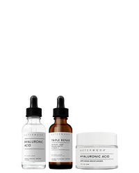 Asterwood Skincare Hero Trio: Hyaluronic Acid serum, Triple Repair amber serum, and Hyaluronic Acid Anti-Aging Moisturizer jar.
