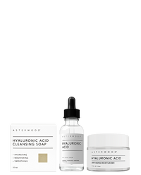 Asterwood Minimalist Collection: Hyaluronic Acid Cleansing Soap carton, HA Anti-Aging Serum dropper bottle, and HA Anti-Aging Moisturizer jar.
