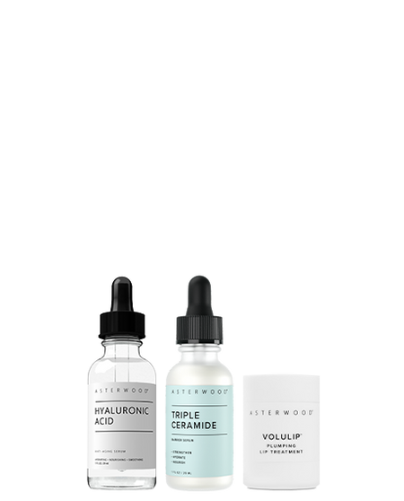 Asterwood Winter Glow Bundle: Hyaluronic Acid serum, Triple Ceramide Barrier Serum, and Volulip Plumping Lip Treatment.