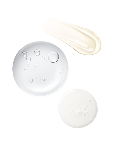 Swatches on white from the Winter Glow Bundle: a clear bubbly serum droplet, a creamy Volulip streak, and a milky ceramide droplet.