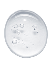 Top-down macro of a clear Asterwood Argireline Serum droplet with tiny bubbles on white, showing the lightweight peptide texture.