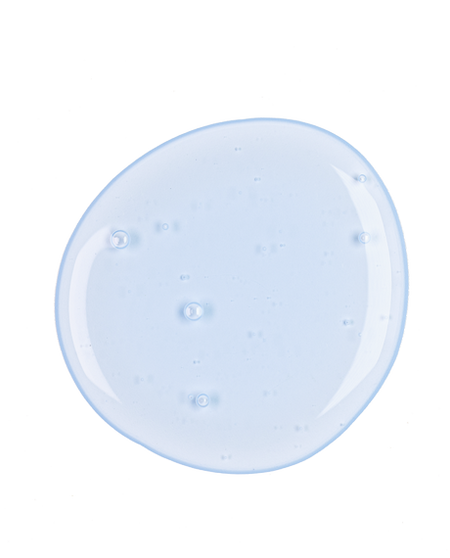 Top-down macro of a blue-tinted Copper Peptides Serum droplet on white showing the lightweight gel texture.