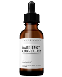 Asterwood Dark Spot Corrector 1 fl oz amber bottle with Radianskin and Hyaluronic Acid, label lists corrective, brightening, revitalizing benefits.