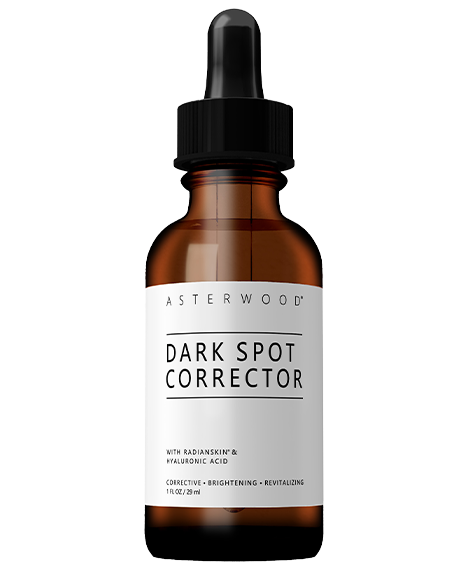 Asterwood Dark Spot Corrector 1 fl oz amber bottle with Radianskin and Hyaluronic Acid, label lists corrective, brightening, revitalizing benefits.