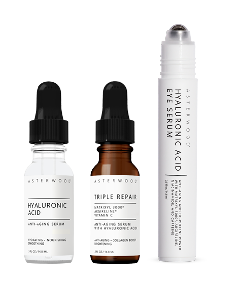 Travel-size trio from the Skincare Essentials Set: HA serum, Triple Repair amber serum, and HA Eye Serum roller pen.