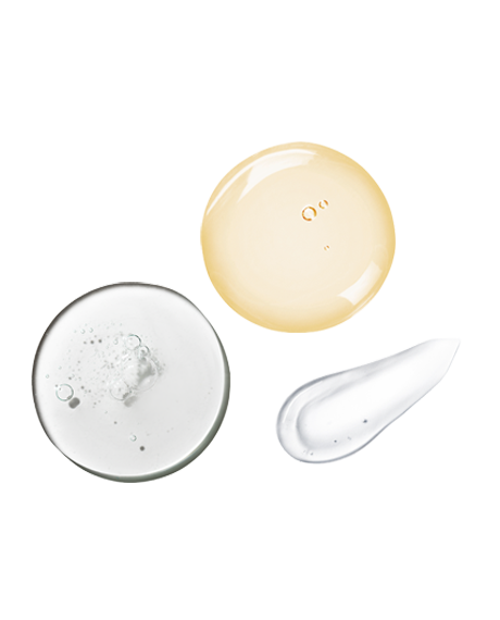 Macro swatches representing the Skincare Essentials Set: clear HA gel, golden Triple Repair drop, and a white moisturizer streak.