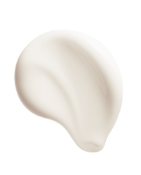 Macro swatch of the soft ivory Triple Repair Cream in a swooping stroke on white, showing the rich whipped texture.