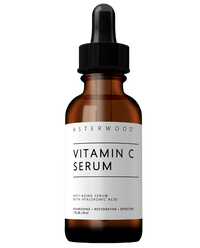 Asterwood Vitamin C Serum 1 fl oz amber bottle, white label noting anti-aging serum with Hyaluronic Acid, nourishing, restorative, effective.