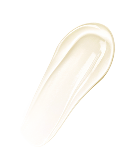 Macro swatch of the soft ivory Volulip lip treatment balm in a smooth stroke on white.